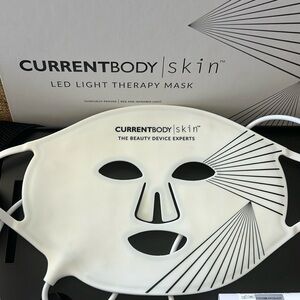 Led red lights therapy face mask diminishing fine lines and wrinkles.